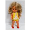 Image 1 : FAMOSA GIRL CHILD DOLL IN YELLOW OUTFIT