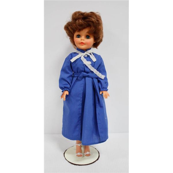 RELIABLE DOLL W/ SHORT BROWN HAIR AND BLUE DRESS