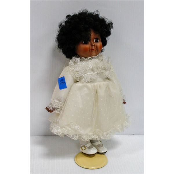 JUNE DYSON ANTIQUES PORCELAIN FACE DOLL IN IVORY DRESS