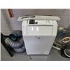 Image 1 : UBERHAUS PORTABLE AIR CONDITIONING UNIT WITH HOSE AND MANUAL MODEL: 87795020