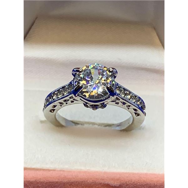 Ladies round cut gemstone ring