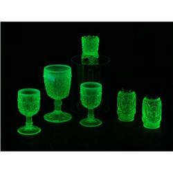 SIX PIECES OF VASELINE GLASS