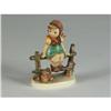 Hummel figurine girl on fence with basket