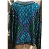 Image 2 : Heavily sequined jacket from the show