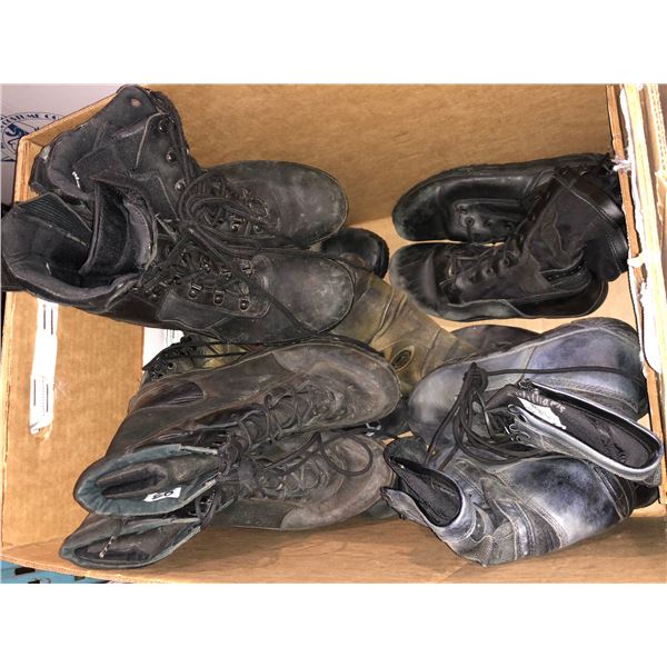 Two boxes of broken down boots from the Sci-fi show