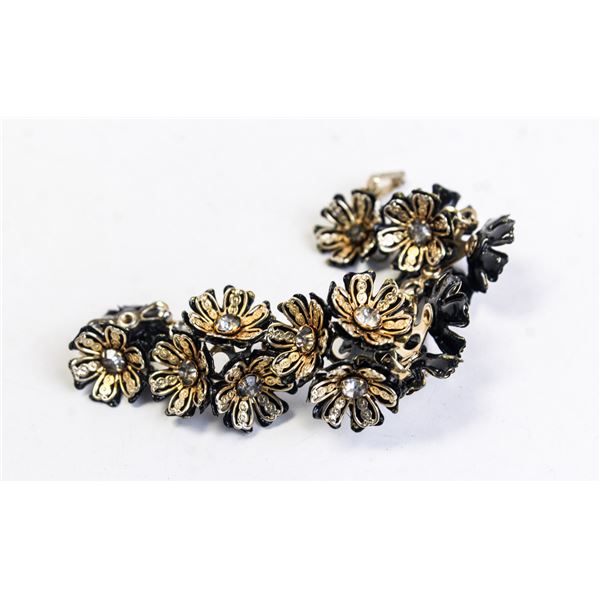GOLD TONE FLORAL BRACELET