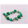 Image 1 : 1960S GREEN BALL WITH GOLD TONE DETAIL BRACELET
