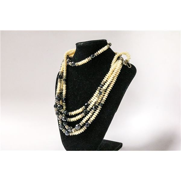 ORNATE CRYSTAL AND BEADED MULTI STRAND NECKLACE