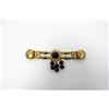 Image 1 : ORNATE GOLD TONE AND BLACK CAPE CLASP