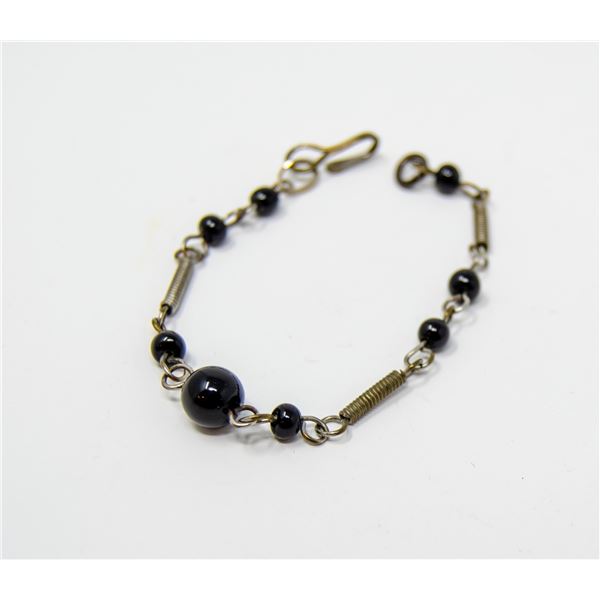BLACK AND SILVER BEADED BRACELET