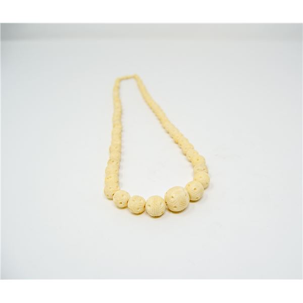 ORNATE WHITE CARVED BEADED NECKLACE