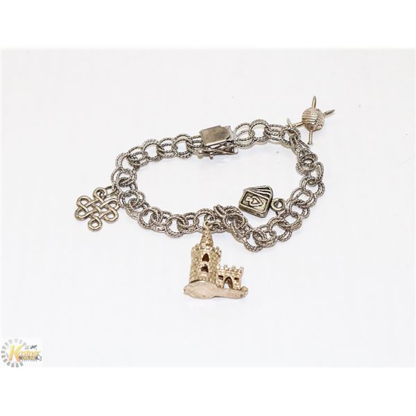 ORNATE STERLING SILVER CHARM BRACELET WITH