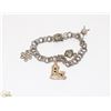 Image 1 : ORNATE STERLING SILVER CHARM BRACELET WITH