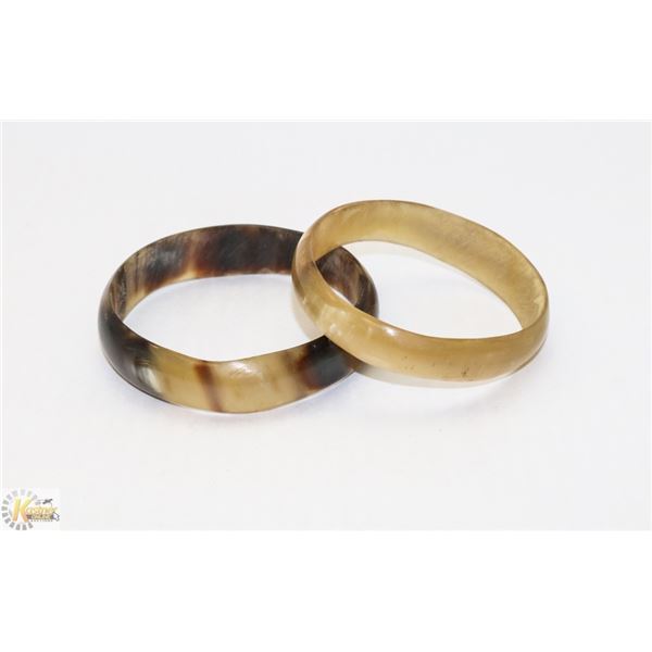 PAIR POLISHED HORN BRACELETS