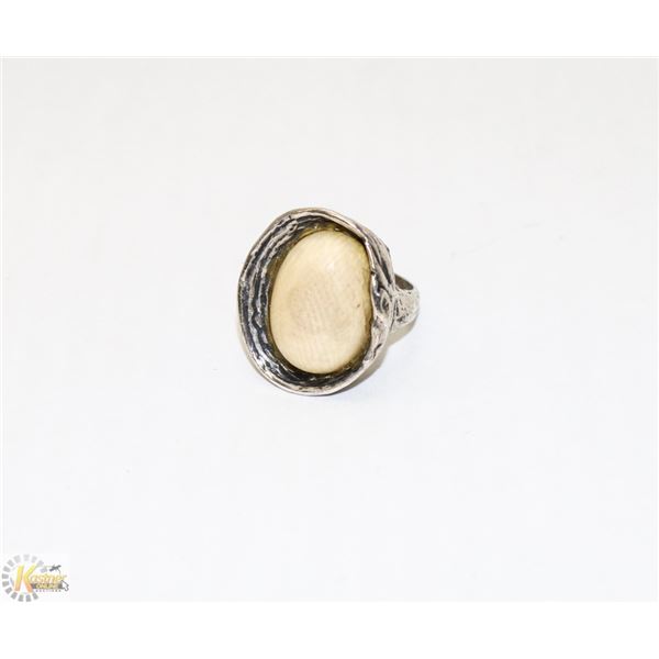 1950S SCANDINAVIAN SILVER RING WITH WHITE CENTRE
