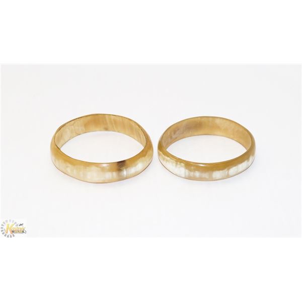 PAIR OF HORN POLISHED BRACELETS