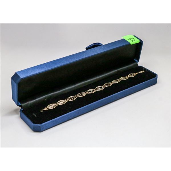 10 KT GOLD OPEN WORK BRACELET 7”