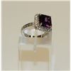 Image 1 : OVERSIZED AMETHYST COLOURED STONE RING SURROUNDED