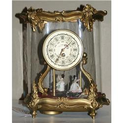 Clock with Two Dolls