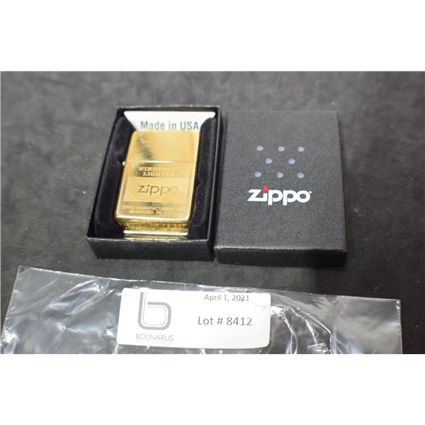 ZIPPO LIGHTER -- NMIB WINDPROOF BRASS