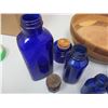 Image 2 : Wooden Bowl With Blue Medice Bottles