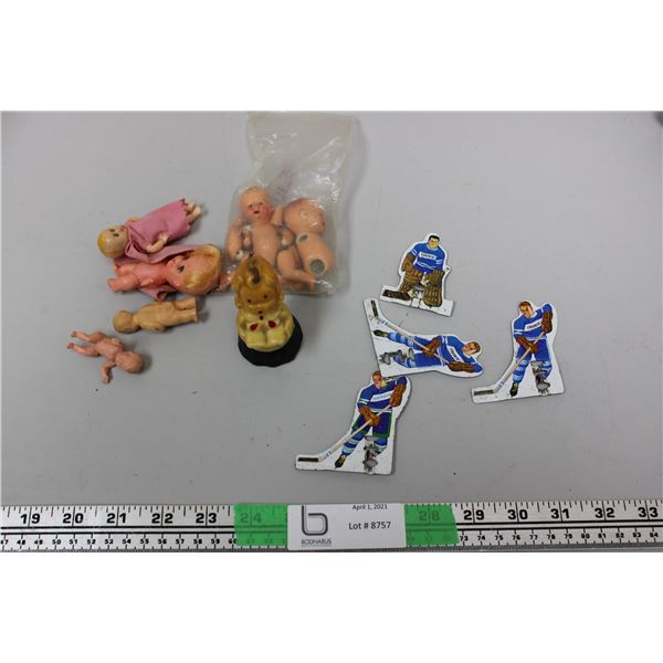 Metal Hockey Players and small dolls