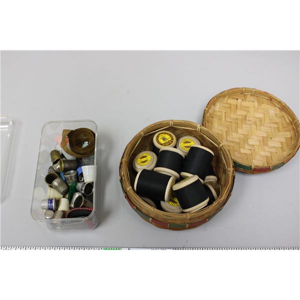 Thimbles and sewing basket with thread