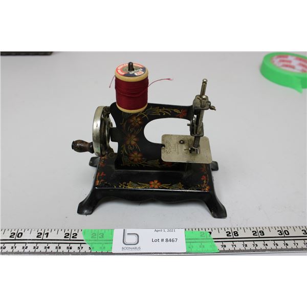 Vintage miniature sewing machine made in Germany