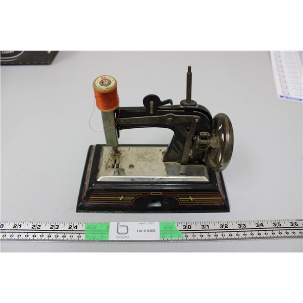 Vintage miniature sewing machine made in Germany for parts