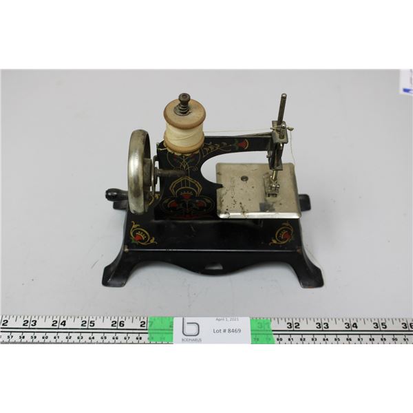 Vintage miniature foreign sewing machine made in Canada