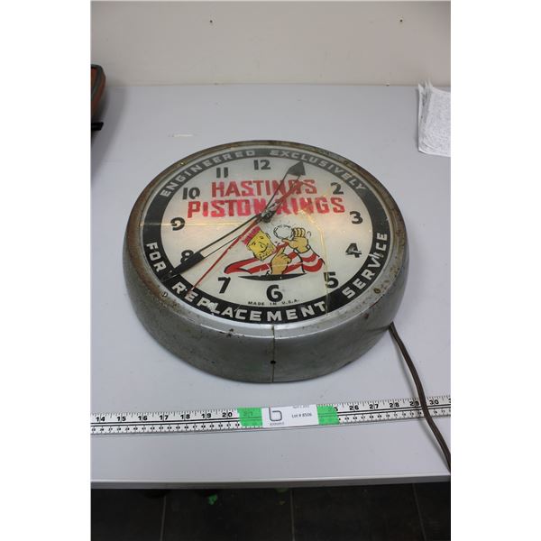 Hasting piston rings clock (working) glass is cracked 12"