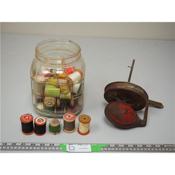 Vintage yarn with wooden spools in glass jar with butter churn top (missing paddles)