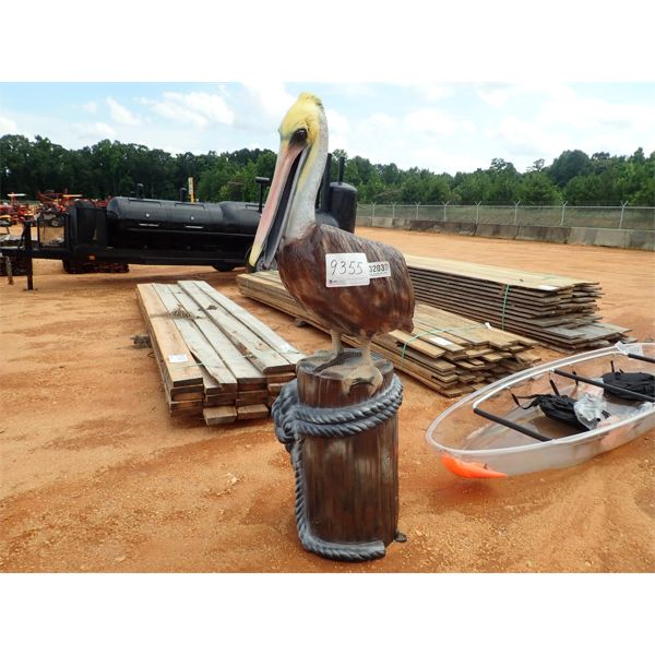 aluminum pelican on sea wall post (C-6)