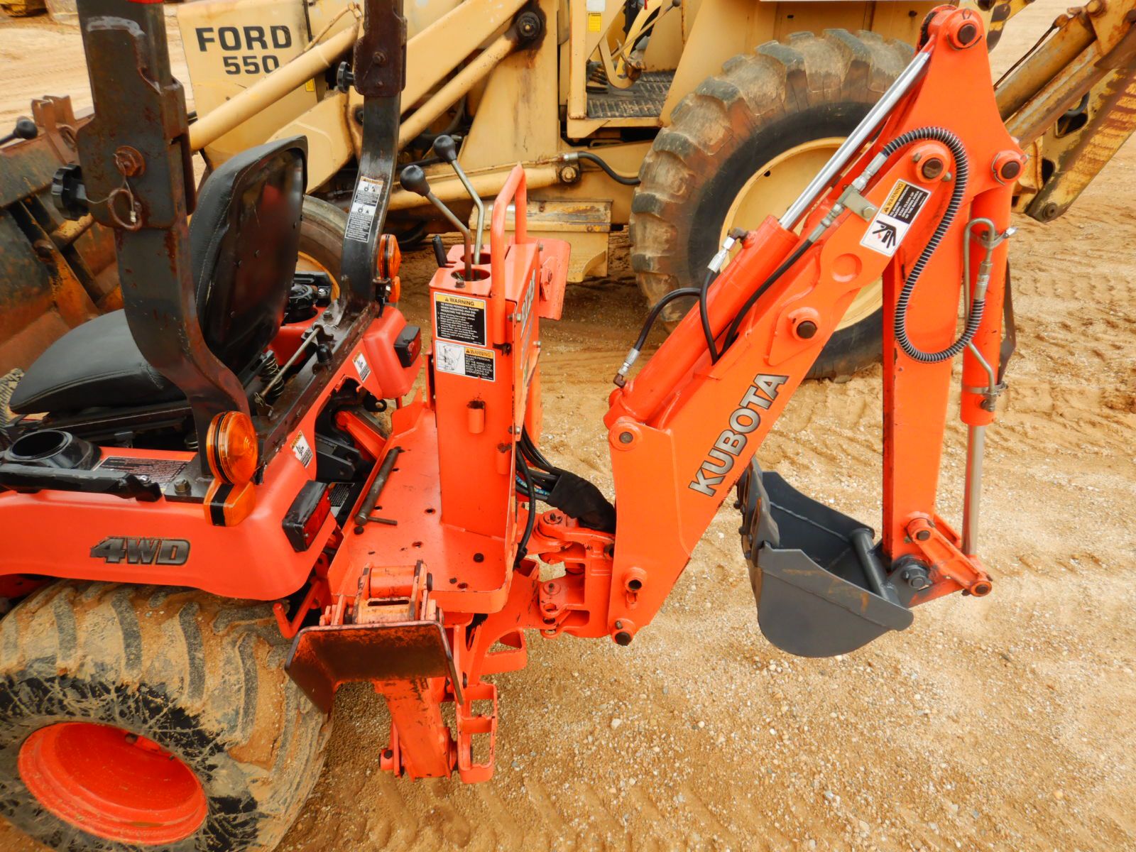 KUBOTA BX23 MINI Backhoe J.M. Wood Auction Company, Inc.