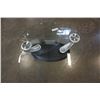 Image 3 : MODERN GLASSTOP SWIVEL COFFEE TABLE WITH CAST IRON BASE