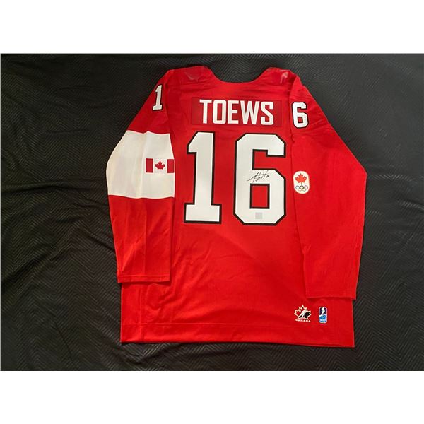 JONATHAN TOEWS FRAMEWORTH AUTOGRAPHED 2014 TEAM CANADA JERSEY WITH FRAMEWORTH C.O.A