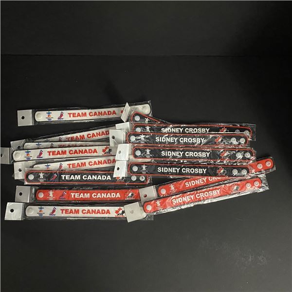 LOT OF 15 2010 OLYMPIC BRACELETS STILL IN PACKAGES