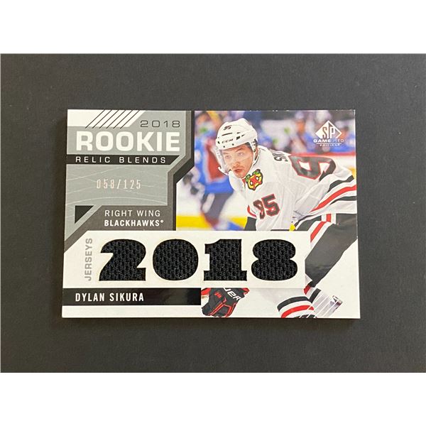 DYLAN SIKURA CHICAGO BLACKHAWKS QUAD JERSEY CARD #058 OF 125 MADE!