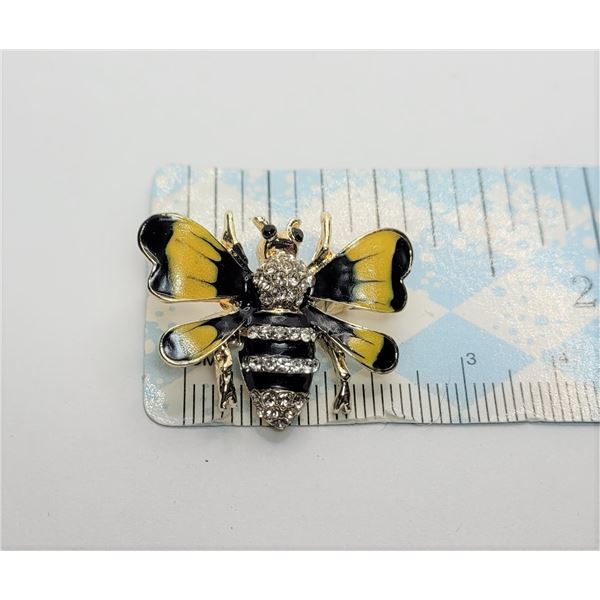 12)   GOLD TONE AND BLACK & YELLOW ENAMEL