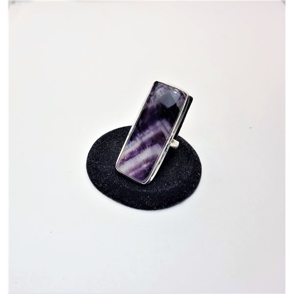 23)  ELONGATED RECTANGULAR AMETHYST RING
