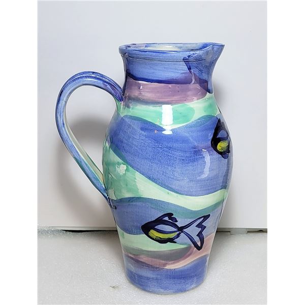 19)  HAND CRAFTED POTTERY JUG FROM