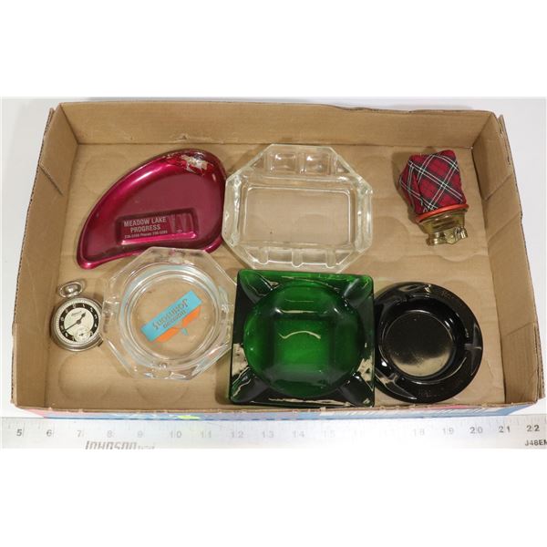 UNCLAIMED FLAT OF ASHTRAYS, LIGHTERS, AND