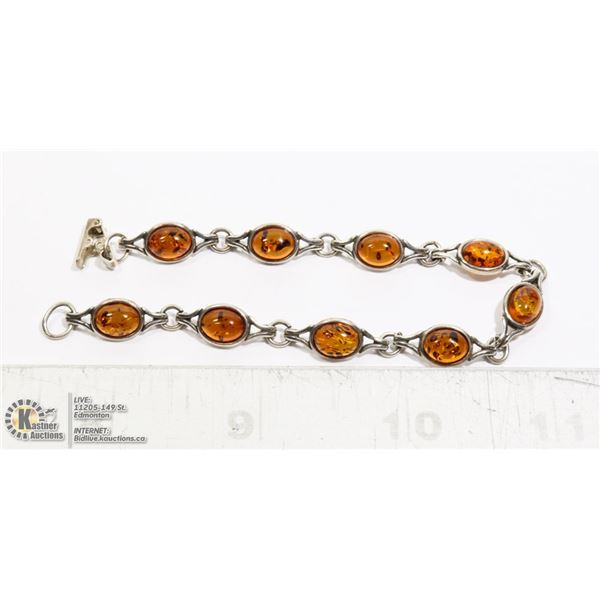 SILVER BRACELET WITH OVAL AMBER STONES