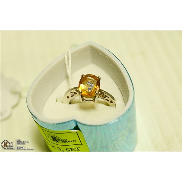 NEW. FLOATING SAPPHIRES X 3, SET IN OVAL CITRINE