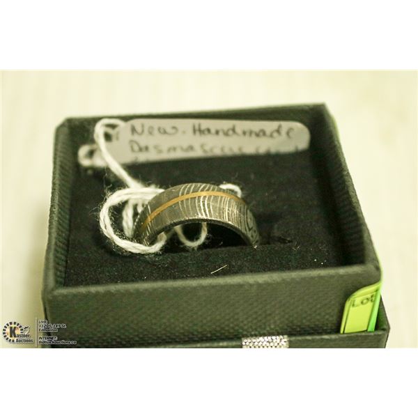 NEW. RING. HAND MADE DAMASCUS STEEL. 7.6 GRAMS