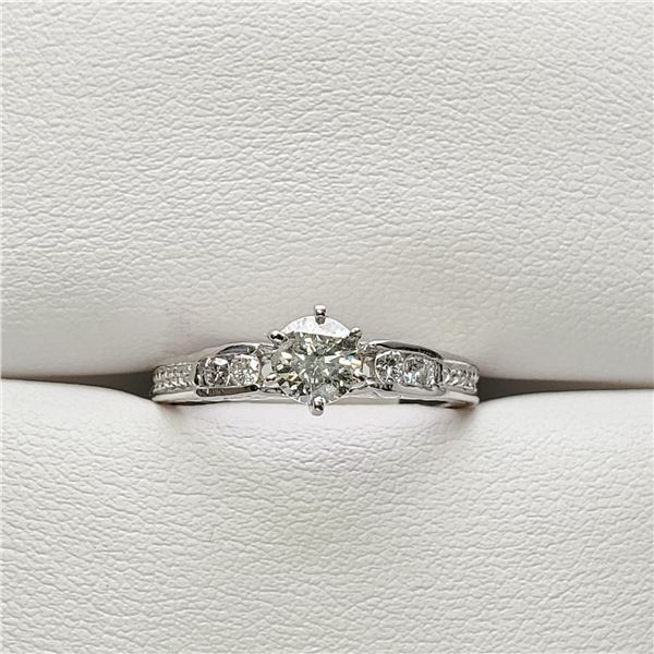 14) PLATINUM DIAMOND RING