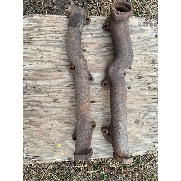 LEFT AND RIGHT EXHAUST MANIFOLDS.