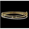 Image 1 : 1.31 ctw Diamond Bangle Bracelet - 14KT Yellow and White Gold