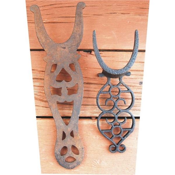 2 nice antique iron bootjacks