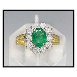 AN 18K GOLD RING WITH 1.05 CARAT EMERALD #1607269